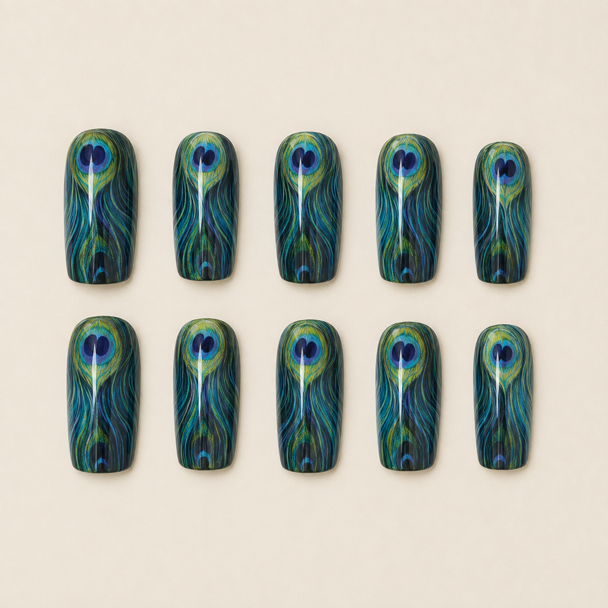 Imperial Plumage peacock feather press-on nail set flat lay
