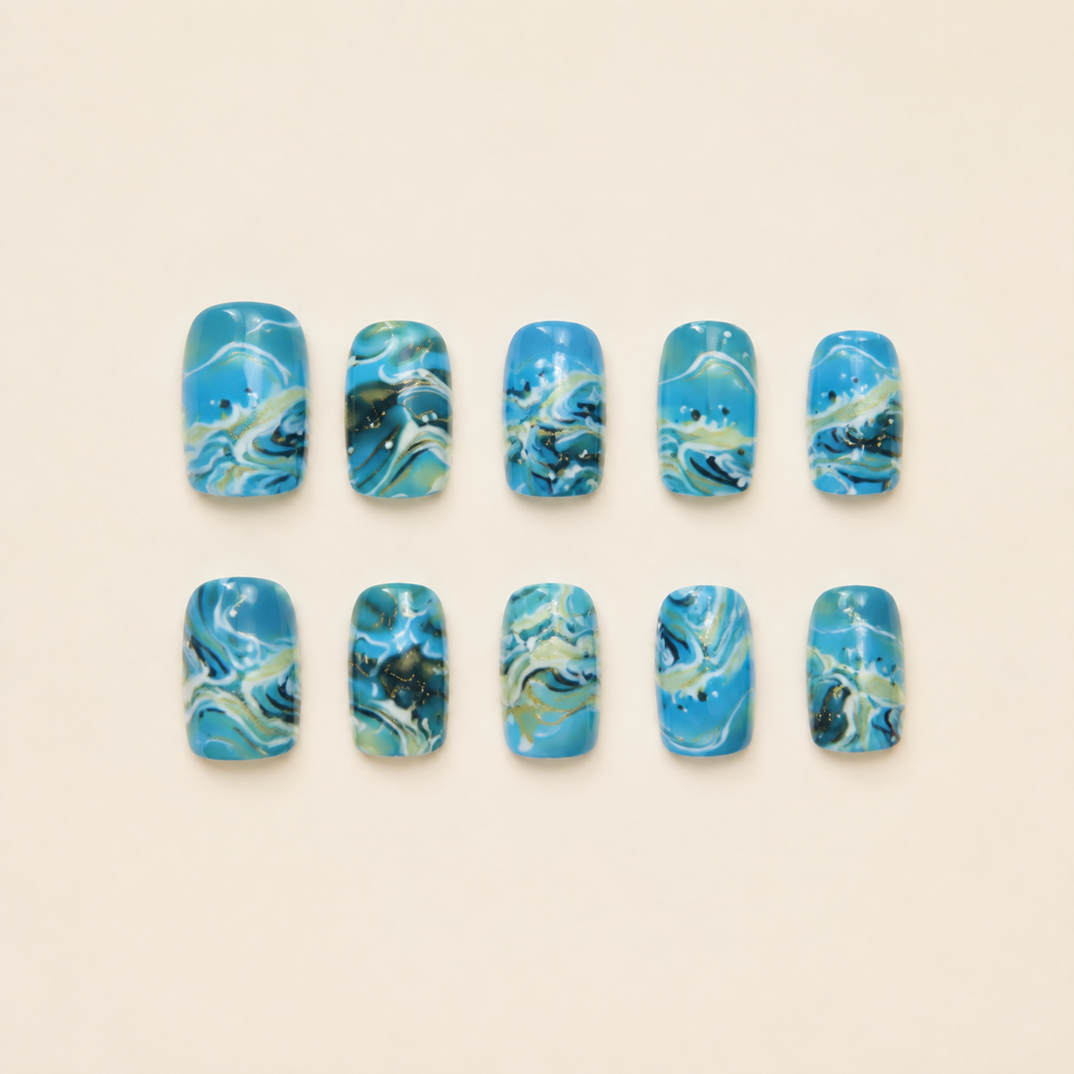 Deep Ocean Marble | Blue & Gold Press-On Nails flat lay