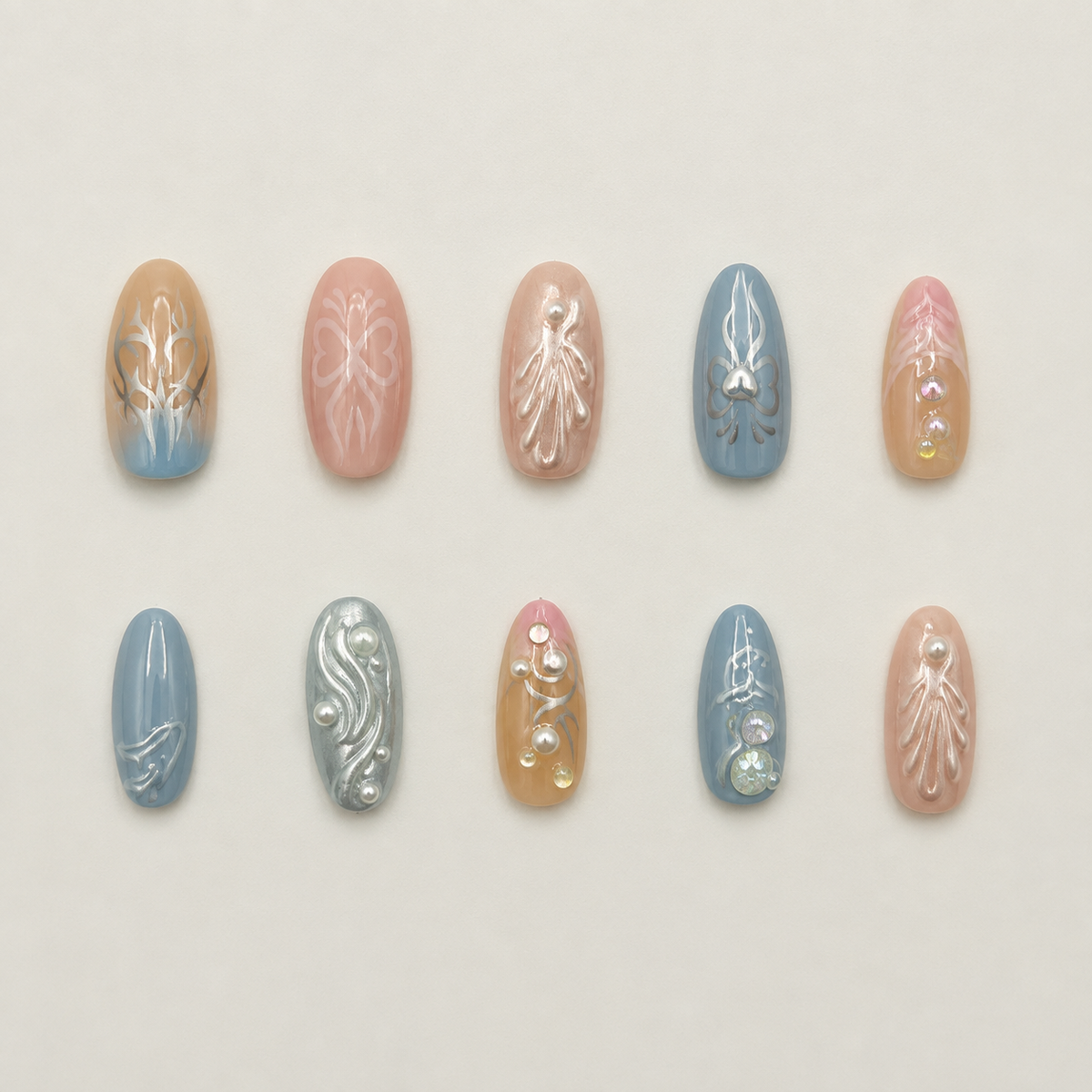 Angelic Cyber | Pastel Silver Tribal Press-On Nails flat lay