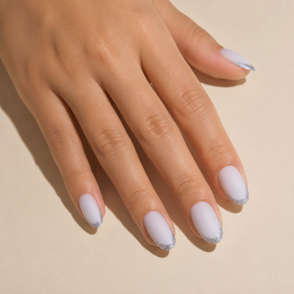 Frosted Glamour | Matte White Silver French Press-On Nails worn on hand