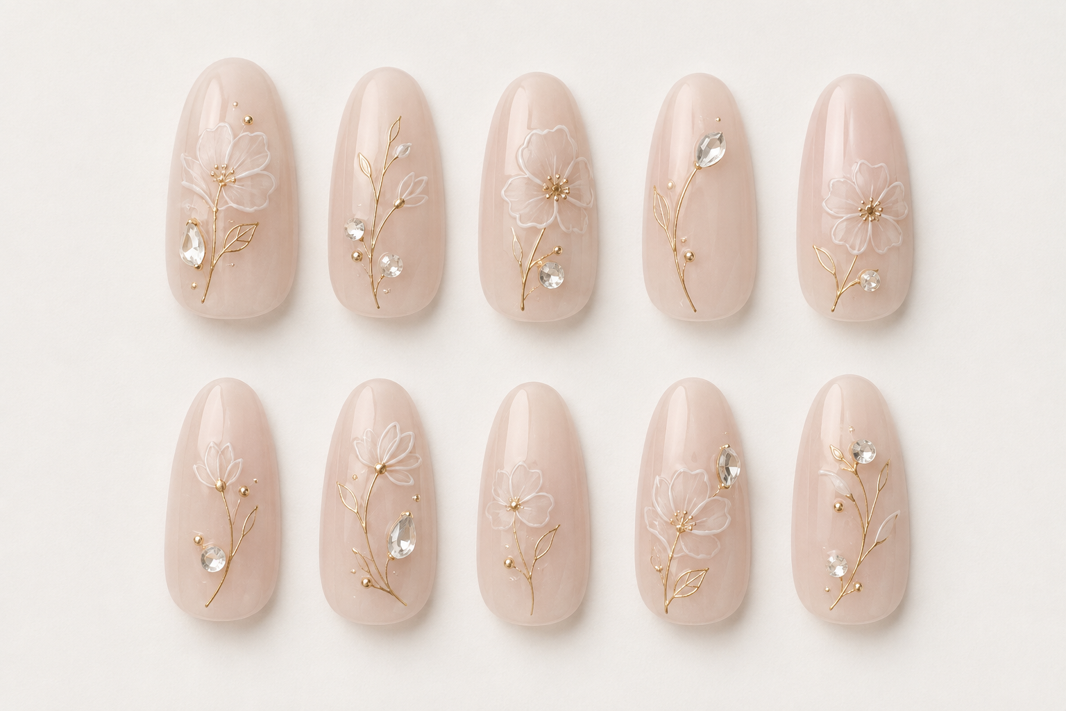 Golden Grace Fine-Line Floral Almond Press-On Nails flat lay