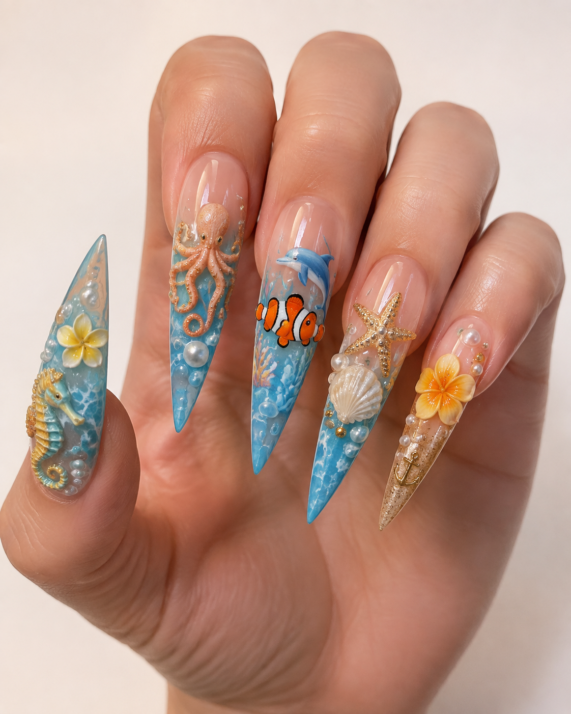 Under The Sea 3D Ocean Realm Stiletto Press-On Nails worn on hand