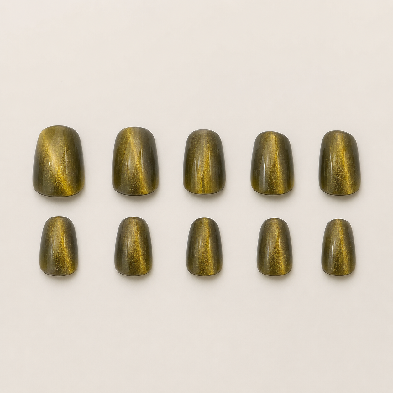 Golden Olive Tiger's Eye Magnetic Almond Press-On Nails flat lay