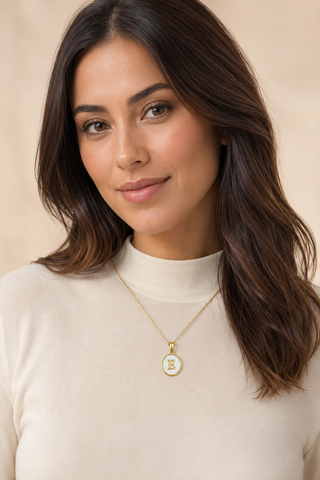 Model wearing Shell Initial Gold Pendant Necklace – E