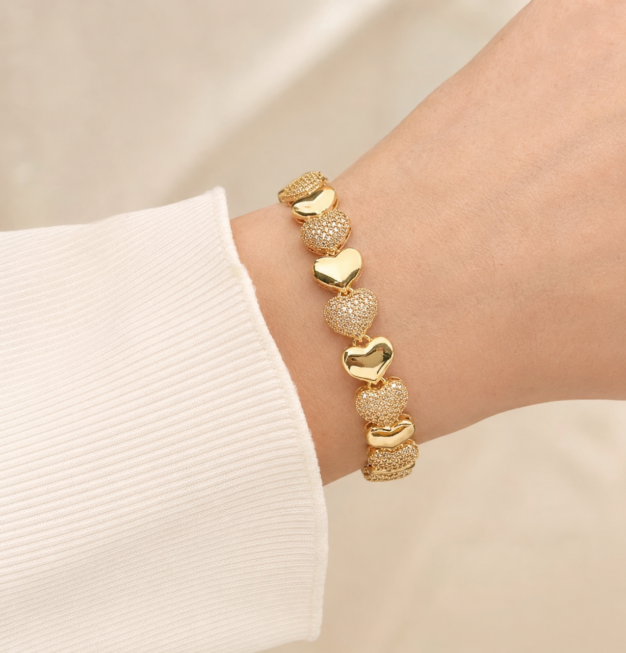 Model wearing Textured Heart Gold Bracelet – Style C