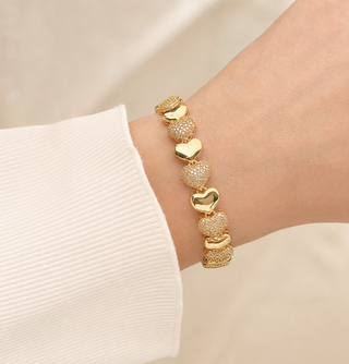 Model wearing Textured Heart Gold Bracelet – Style C