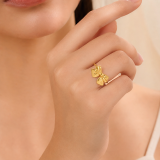 Model wearing Sculpted Gold Bow Adjustable Ring