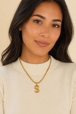 Model wearing Puffy Initial Gold Pendant Necklace – S