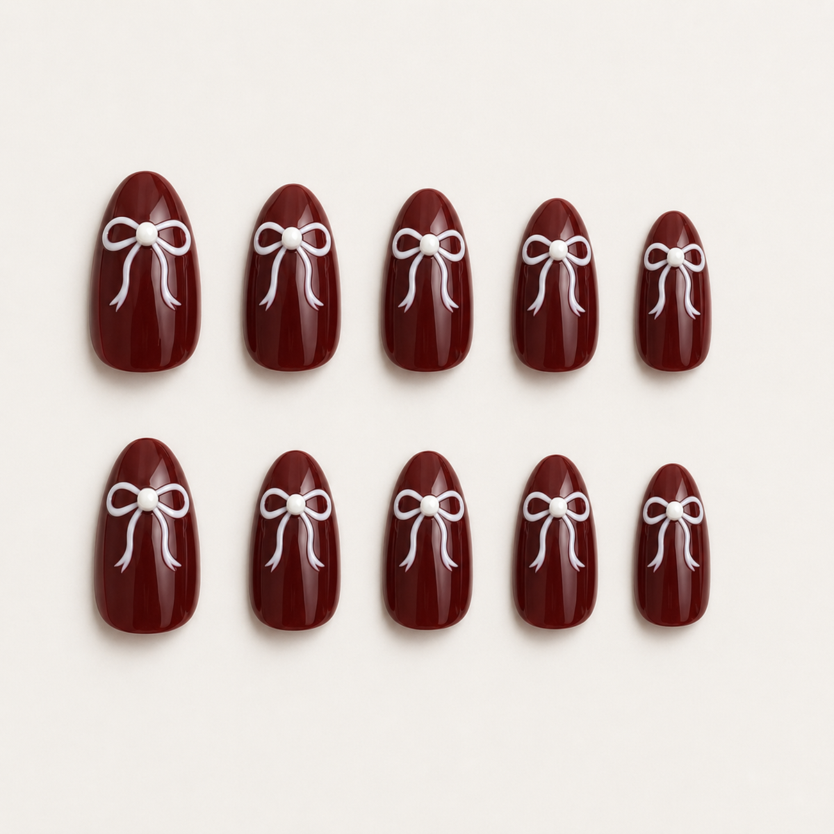 Merlot Bow Press-On Nails - handshot
